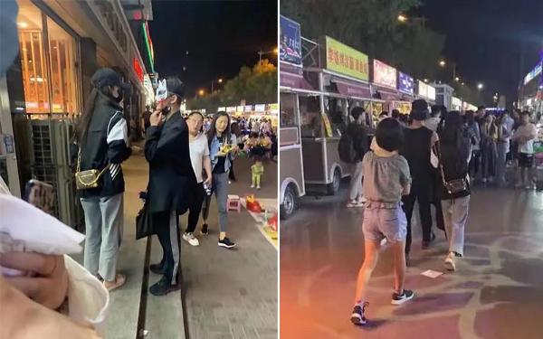 夏之光钟丽丽街头被偶遇 主动拎包牵手游逛夜市显亲密
