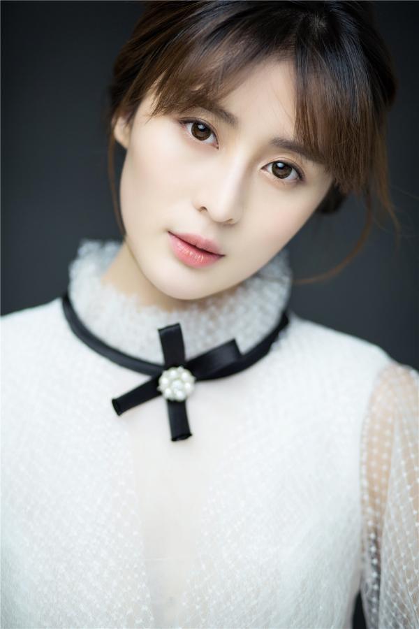 汤晶晶曝白衣仙气写真 清新婉约尽显纯净气质