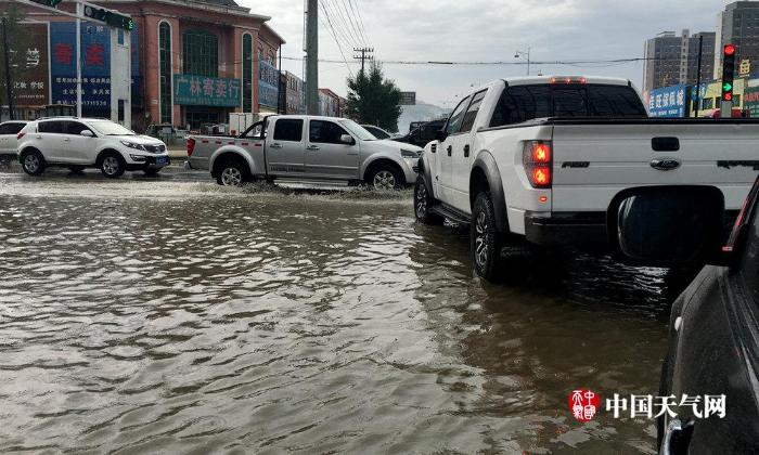 辽宁遭遇强降雨局地大暴雨 多地道路冲毁农田被淹