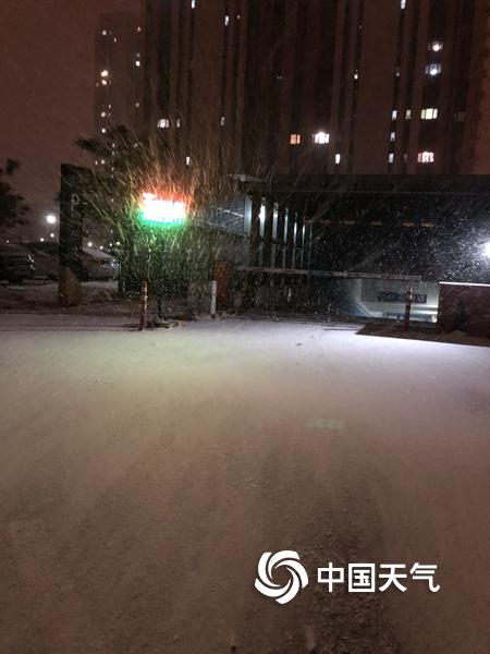 北京喜迎初雪 银装素裹庆新春