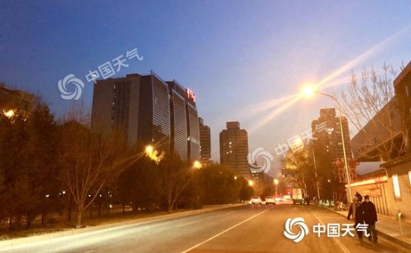北京寒冷中迎小年山区有零星小雪 明起气温回升