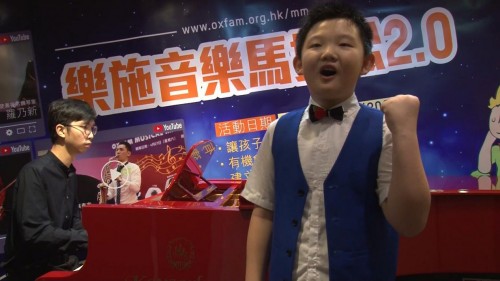 廖明飞带领15名学生，为“乐施音乐马拉松”演奏筹款