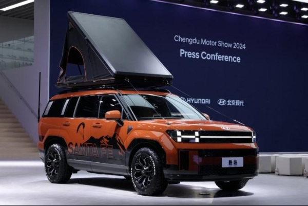 “户外轻野中大型SUV”北京现代第五代胜达上市 售价19.58万元起