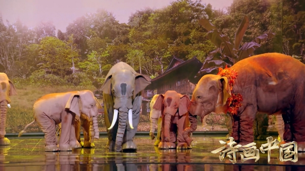一群人站在大象旁边描述已自动生成