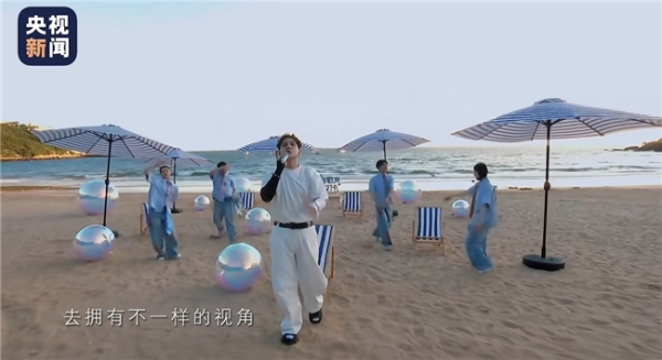 两度登央视春晚 艾热亮相央视新闻《跟着歌声去打卡》海岛音乐会