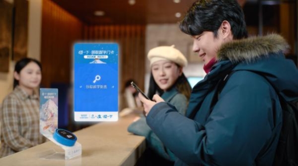 “碰一下”入住，万达酒店还在进化