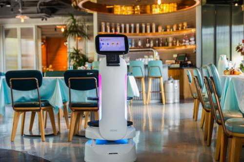 亮相美国芝加哥餐饮展，九号机器人吹响商用服务机器人全球化号角