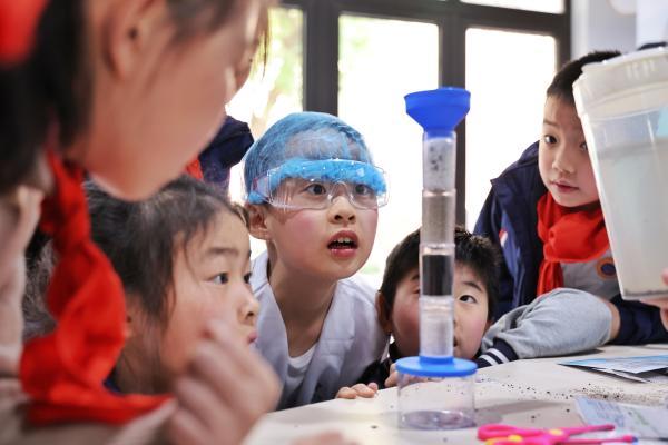 迎水教育十周年，康师傅公益首站点亮金汇实验学校