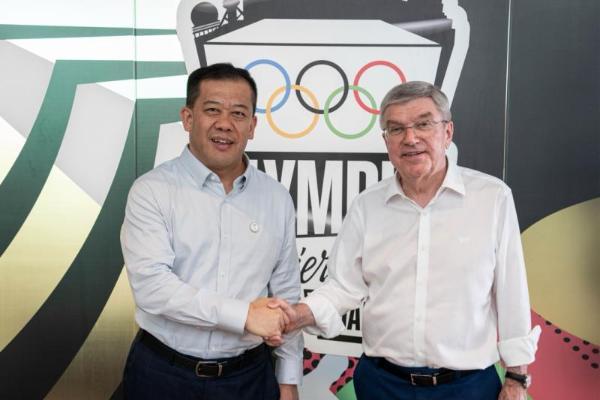 蒙牛总裁高飞与国际奥委会主席巴赫在上海会面